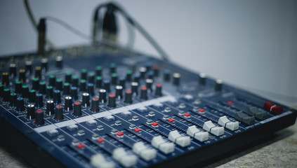 Professional mixing console in studio. Used for audio signals modifications to achieve the desired output. 