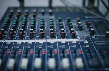 Professional mixing console in studio. Used for audio signals modifications to achieve the desired output. 