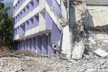 Old building collapse after earthquake wating to demolish by engineer.