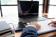 © ntinai - Businessmen, finance, accounting work, checking accounts, using calculators and finding information