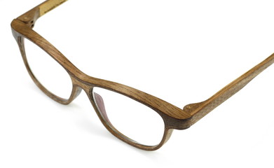 Wooden optical glasses isolated over the white background. 