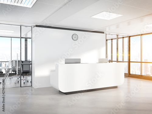 Blank White Reception Desk In Concrete Office With Large Windows