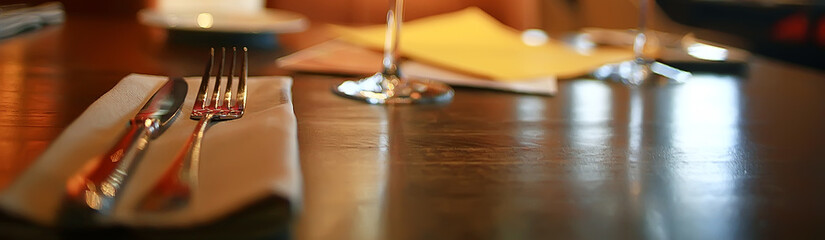 Canvas Print - fork and knife serving in the interior of the restaurant / table in a cafe, food industry catering, menu