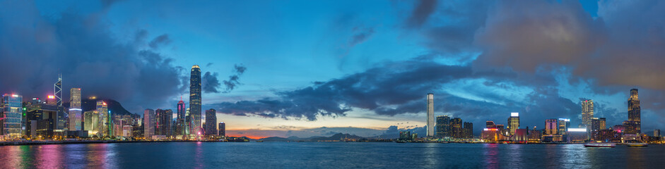 Poster - Panorama of Skyline and harbor of Hong Kong city at dusk