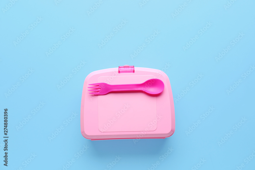 Plastic lunch box on color background