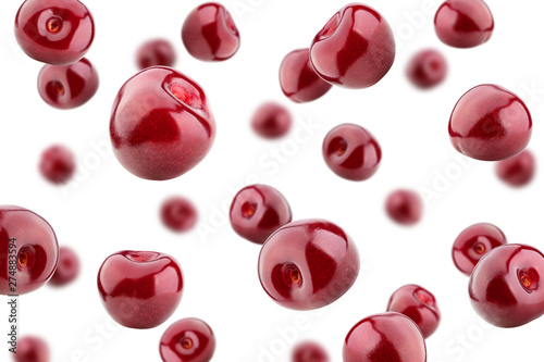 Fotografía Falling cherry isolated on white background, selective focus