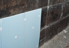 Basement Rigid Insulation Details With Damp Proofing And Wall Insulation Anchors Outdoors