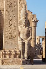 Looking Aside The Obelisk And The Statue Of Ramesses II Into The Temple Of Luxor