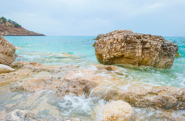 Beaches of the island of Sardinia in the Mediterranean Sea in sunlight in spring