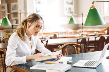 Poster - Pretty young smart girl student studying