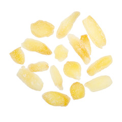 Ginger candied fruit, dried ginger with sugar on a white background, top view