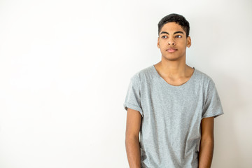 Portrait of a beautiful fashion afro american young man. Teenager mixed race black.