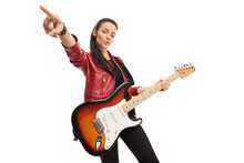 Young Female Musician With A Bass Electric Guitar