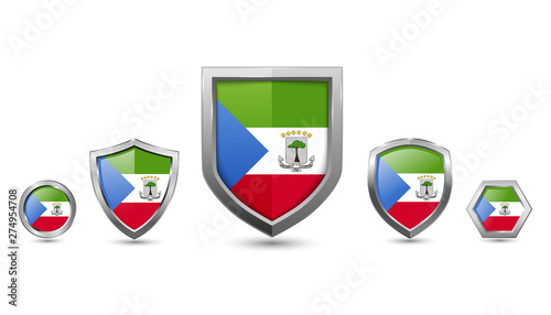 Fotografía set of equatorial guinea country flag with metal shape shield badge