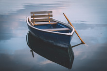 Image Of Wooden Rowing Boat On Lake