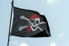 Waving In The Wind Pirate Flag On The Mast