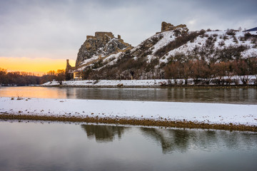 Wall Mural - Snow Covered Devin Castle Ruins above the Danube River in Bratislava, Slovakia at Sunrise