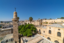 Old Minaret Among Typical Houses Under Blue Sky In Old City Of Jerusalem, Israel (view From Above).