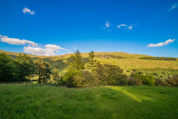 A hill view in blue sky