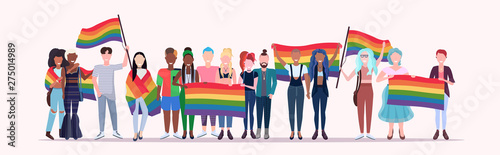 Fotomural people group holding rainbow flag lgbt pride festival concept mix race gays lesb