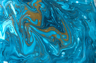  Blue and gold marbling pattern. Golden marble liquid texture.
