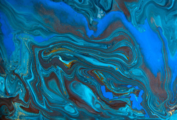  Blue and gold marbling pattern. Golden marble liquid texture.