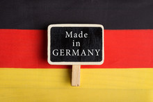 Germany Flag And Blackboard With Text Made In Germany