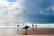 Surfers surfboards beach group Portugal