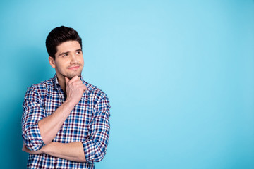 Close up photo amazing he him his macho wonder look up empty space unsure doubtful arm touch chin think over business startup project wear casual checkered plaid shirt isolated bright blue background