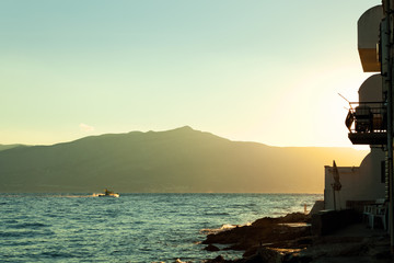 Wall Mural - Beautiful sunrise near waterfront in a harbor of Postira town - Croatia