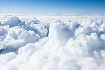 Clouds and sky from airplane window view