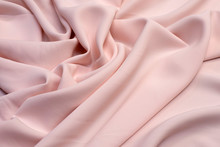 Fabric Viscose (rayon). Color Is Light Pink. Texture, Background, Pattern.