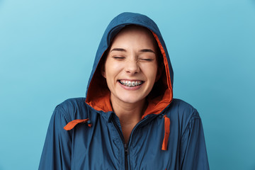 Wall Mural - Close up portrait of a cheerful young girl