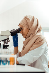 Wall Mural - nice muslim woman thinking about her research