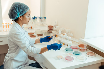 Wall Mural - serious nice woman wearing a laboratory uniform