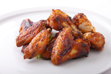 Plate of delicious barbecue chicken wings