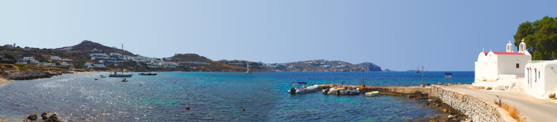 beautiful sunny bay of Saint Ioannis Chapel (Agios Ioannis) on the peninsula of Diakoftis in Mykonos (Greece), island of Cyclades, in the heart of the Aegean Sea