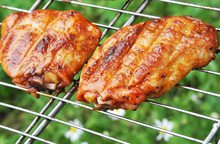 Delicious Chicken Thighs With Spices On The Grill