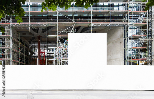 Cuadros en Lienzo Construction site with blank construction fence mockup, fence panel with copy sp