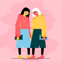 Two young women dressed in modern clothes are standing together. Meeting of friends or colleagues. Female geometric characters isolated on pink background