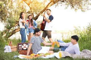 Poster - Happy friends on picnic in park