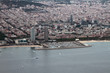 © photobeginner - Barcelona, Spain - Jun 09, 2019: Yacht port and city on sea coast, aerial photograph