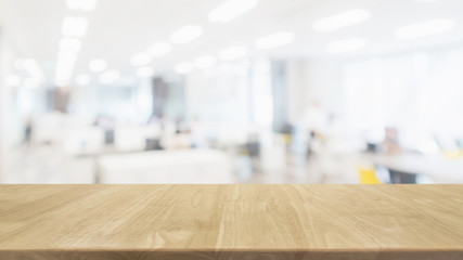 Wall Mural - Empty wood table top and blur glass window wall in office building space interior background - can used for display or montage your products.