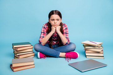 Wall Mural - Portrait of her she nice attractive smart clever disappointed girl wearing checked shirt sitting in lotus pose waiting inspiration isolated over bright vivid shine blue green background