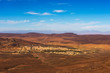 © Nick Fox - View over a village in Morocco with snowy Atlas mountains in the background