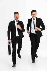 Poster - Two attractive confident businessmen wearing suits