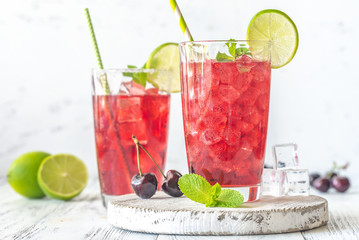 Canvas Print - Two glasses of cherry mojito