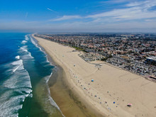 Aerial View Of Huntington Beach And Coastline During Hot Blue Sunny Summer Day, Southeast Of Los Angeles. California. Destination For  Holiday And Surfer