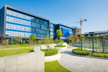 empty brick floor with modern building in background