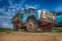 Old Rusting Truck Or Lorry Outdoors In A Field
